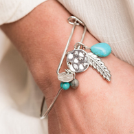 "Root and Ranch" Silver Metal & Blue Turquoise and Feather Charm Tension Bracelet