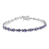 Platinum over Sterling Silver 7.8cts Tanzanite Trillion and Round Line Bracelet (8.00 in)