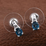 Platinum over Sterling Silver London Blue Topaz & White Topaz Stud Earrings