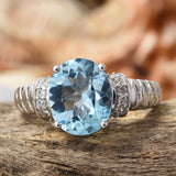 Platinum over Sterling Silver Blue TOPAZ and White ZIRCON Ring