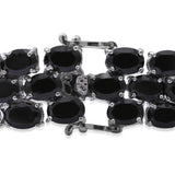 Platinum over Sterling Silver Thai Black Spinel Widened Line Tennis Bracelet ( 7.25 in) 70 cts