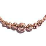 14K Rose Gold over Sterling Silver Graduated Textured Bead Adjustable Bracelet