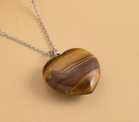 75Ct. African Tiger's Eye Heart Pendant Necklace with 20 Inches Stainless Steel included.