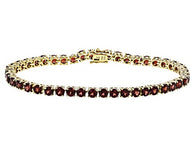 18k Yellow Gold over Sterling Silver 12cts. Mozambique GARNET Line Tennis Bracelet (7 in)