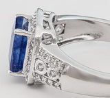 Rhodium over Sterling Silver Blue SAPPHIRE and White Topaz Halo Ring