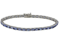 Rhodium over Sterling Silver Oval 7.7cts. Tanzanite Tennis Line Bracelet (7.50 in)